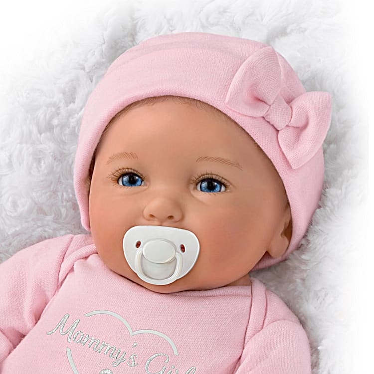 Soft baby doll 2025 with magnetic pacifier