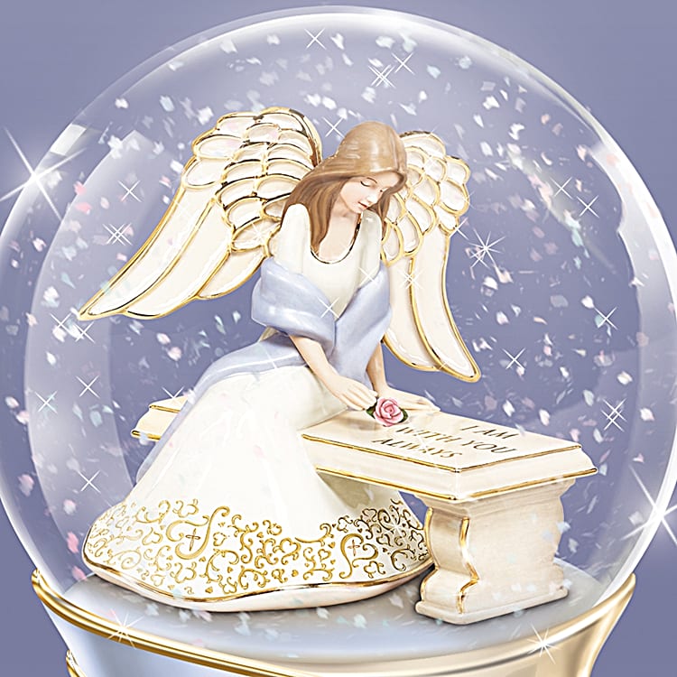 Angel snow globe shop