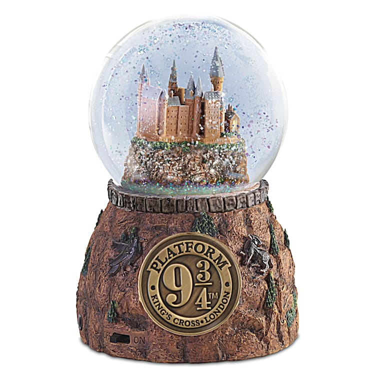 Hogwarts express illuminated musical globe with shop moving train