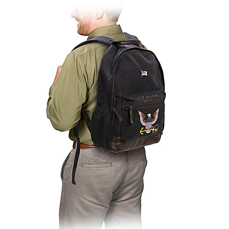 U.S. Navy Black Canvas Backpack Featuring An Embroidered U.S. Navy Emblem &  Brown Faux Leather Accents With A Free American Flag Pin