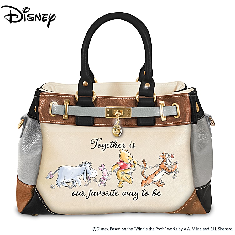 Disneys Winnie The Pooh Faux Leather Handbag Adorned With Colorful Winnie The Pooh Character Art With An Adjustable Strap And Gold Tone Hardware