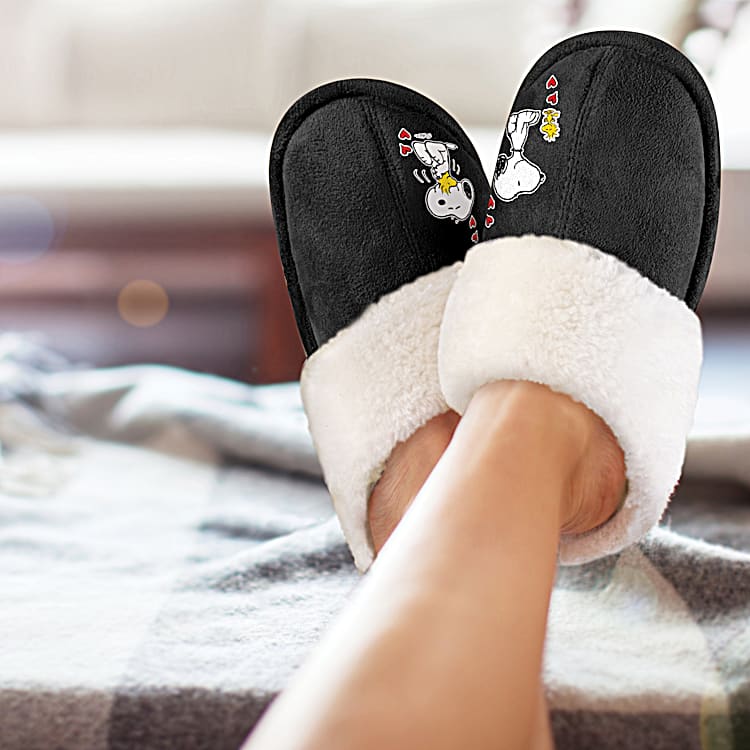 PEANUTS Snoopy And Woodstock Black Faux Suede Slippers Adorned With Snoopy And Woodstock Art Feature A Flexible Sole Lined With Cozy Faux Fur