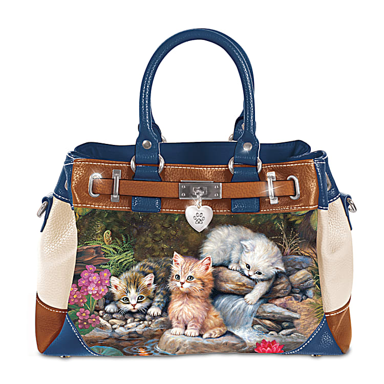 Playful Kittens Handbag With Adjustable Shoulder Strap Featuring Pebbled Faux Leather And A Heart Shaped Silver Tone Charm