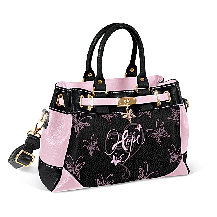 Hope For A Cure Handbag With Adjustable Shoulder Strap Featuring Pebbled Faux Leather And A Charm