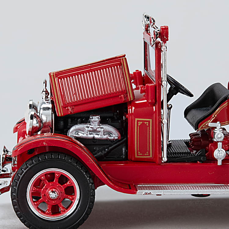 A Heroes Tribute 1 32 Scale Diecast Fire Truck Collection Featuring A 1926 Ford Model T And A 1928 Studebaker Fire Truck With Red Finishes