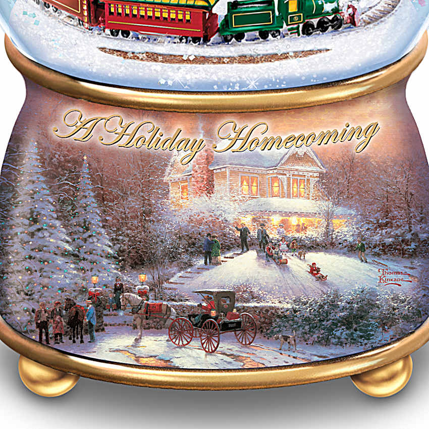 Holiday Snowglobes Featuring Rotating Motion And Adorned With