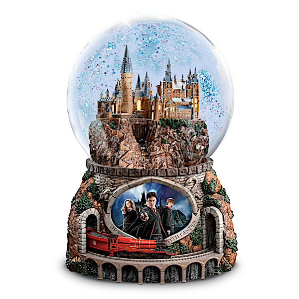 HARRY POTTER Musical Glitter Globe with Rotating Train and Movie Image Lights Up