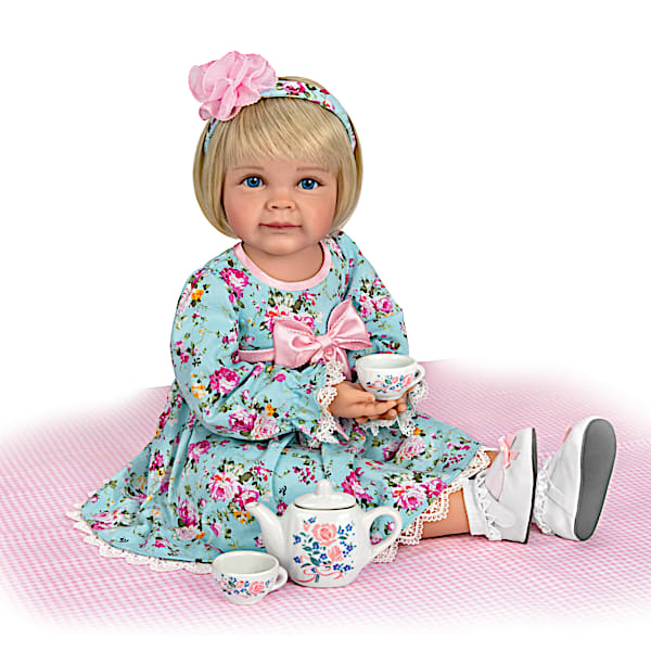 Toddler Doll With Porcelain Tea Set Is Perfect For Posing