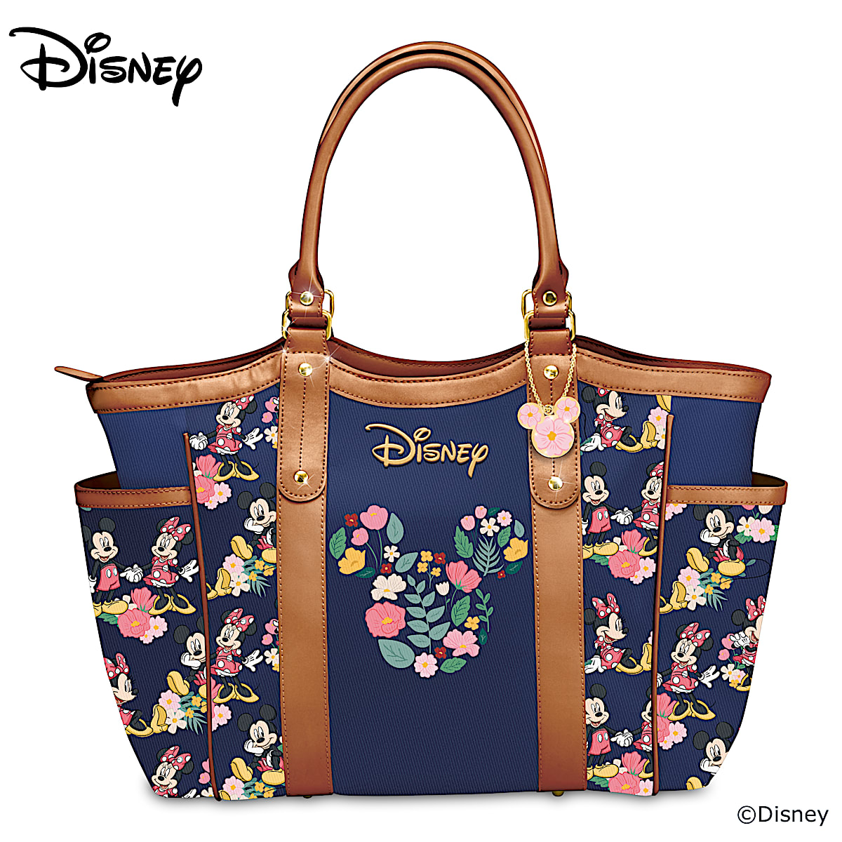 Disney Natures Sweetest Friends Poly Twill Shoulder Tote Bag With Brown Trim Featuring A Floral Print Pattern With A Mickey Mouse Ear Shaped Charm