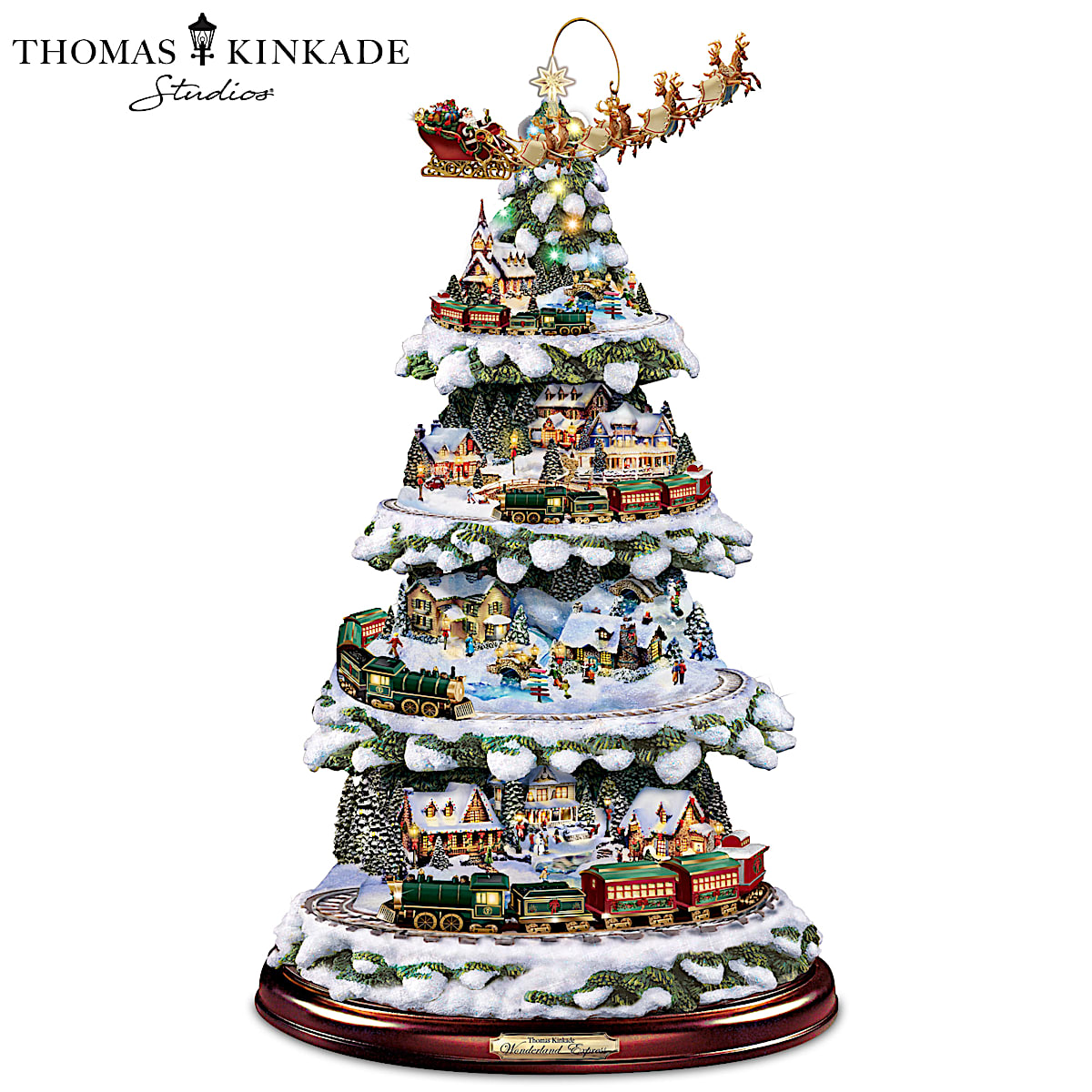 Christmas tree with shop a train in it
