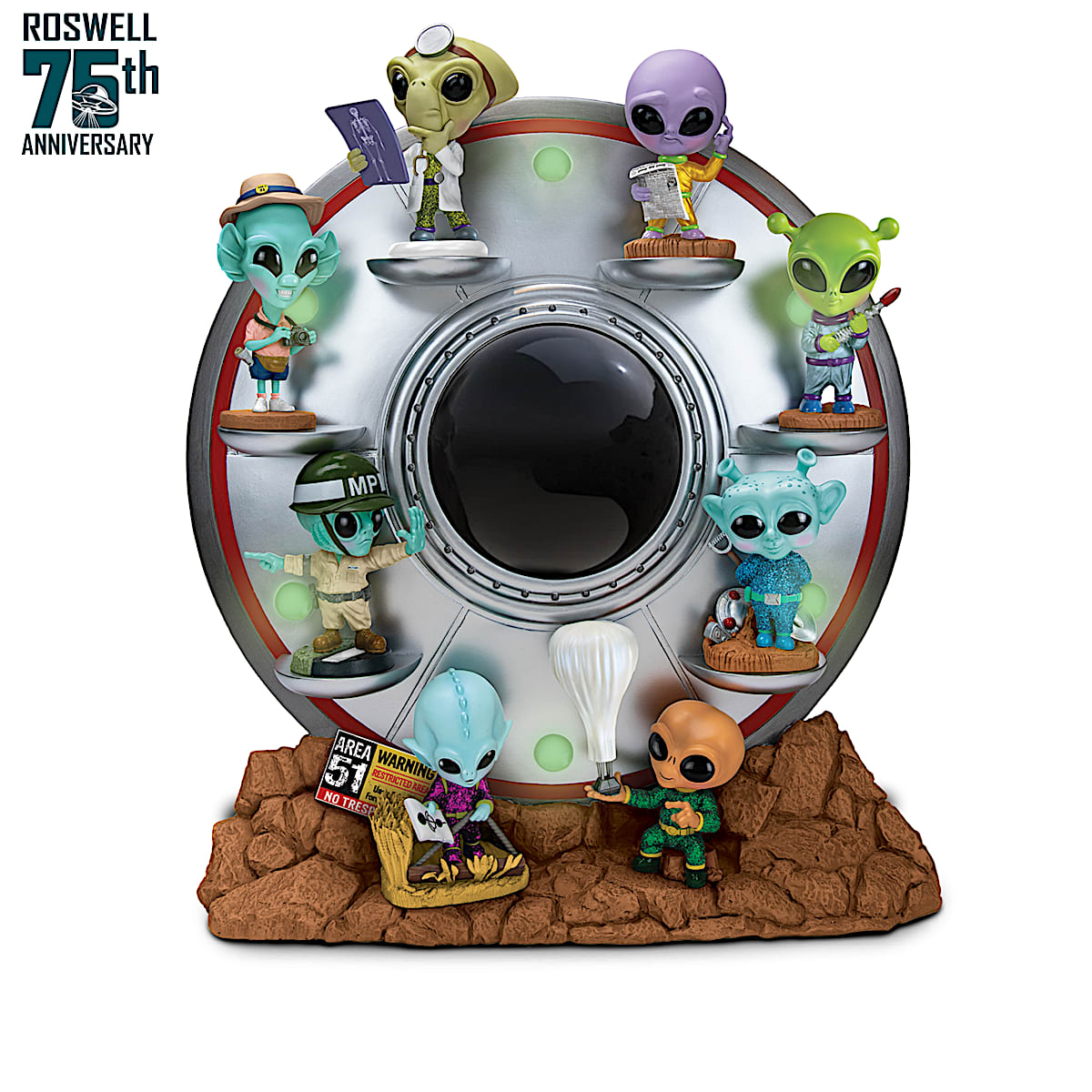 Miniature alien figures top