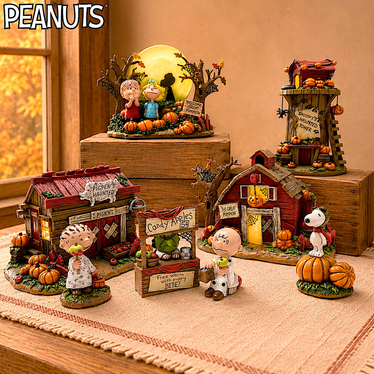 The PEANUTS Trick Or Treat Illuminated Halloween Village Collection