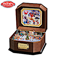 Rudolph Music Box With Sculptural North Pole Scene