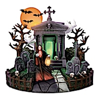 Crypt Sculpture Lights Up & Projects Spooky Images & Sounds