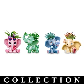 Sculptural Elephant Planters With Artificial Succulents