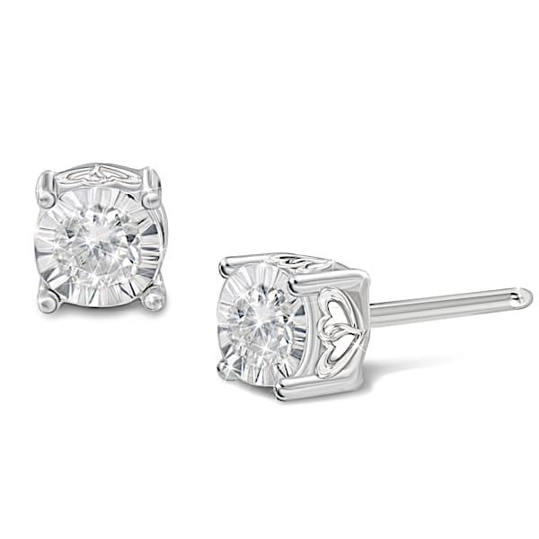 Sterling Silver Stud Earrings Set With 1 Diamond Each And Adorned With An Interlocking Heart Filigree Design On The Sides